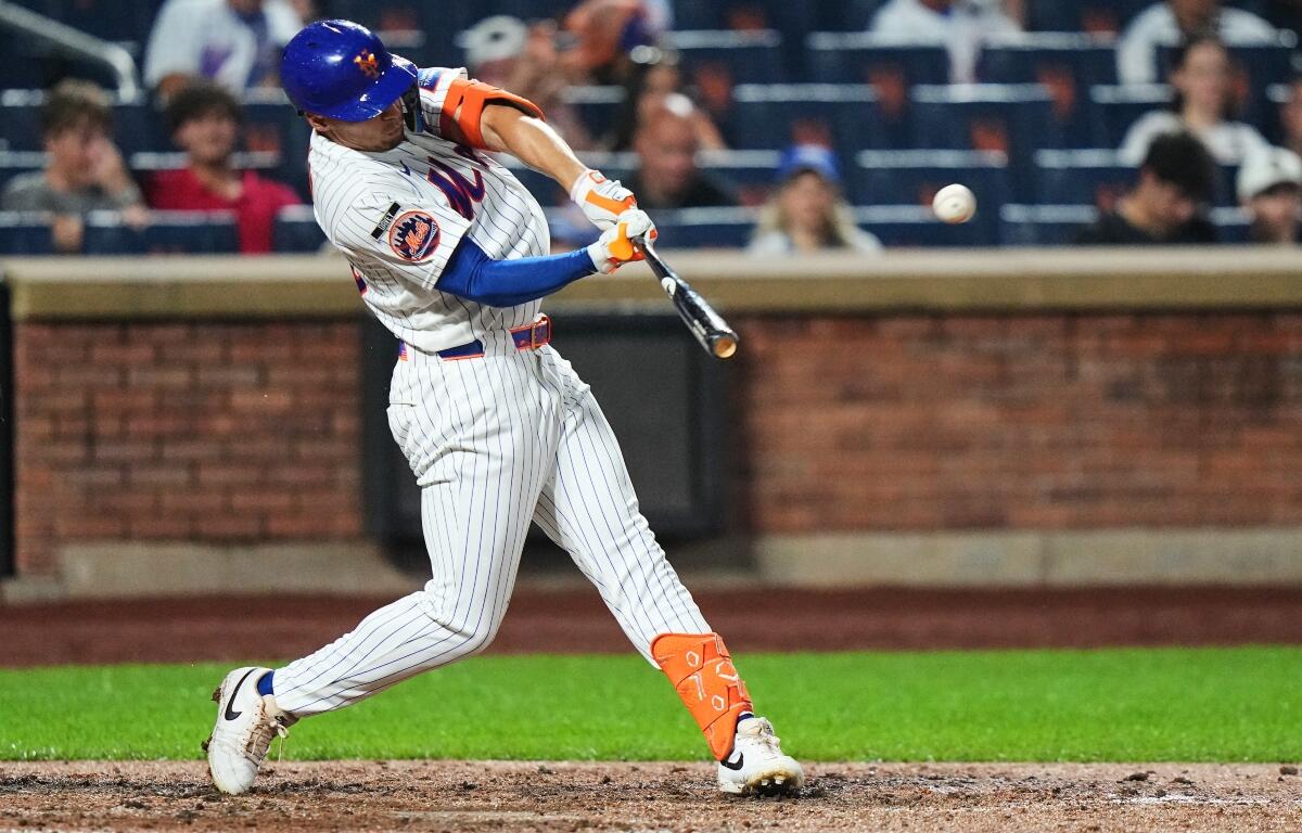 New York Mets' Tyrone Taylor hits a three-run home run during the seventh inning of a baseball game against the Atlanta Braves Monday, July 27, 2026, in New York. (AP Photo/Frank Franklin II)