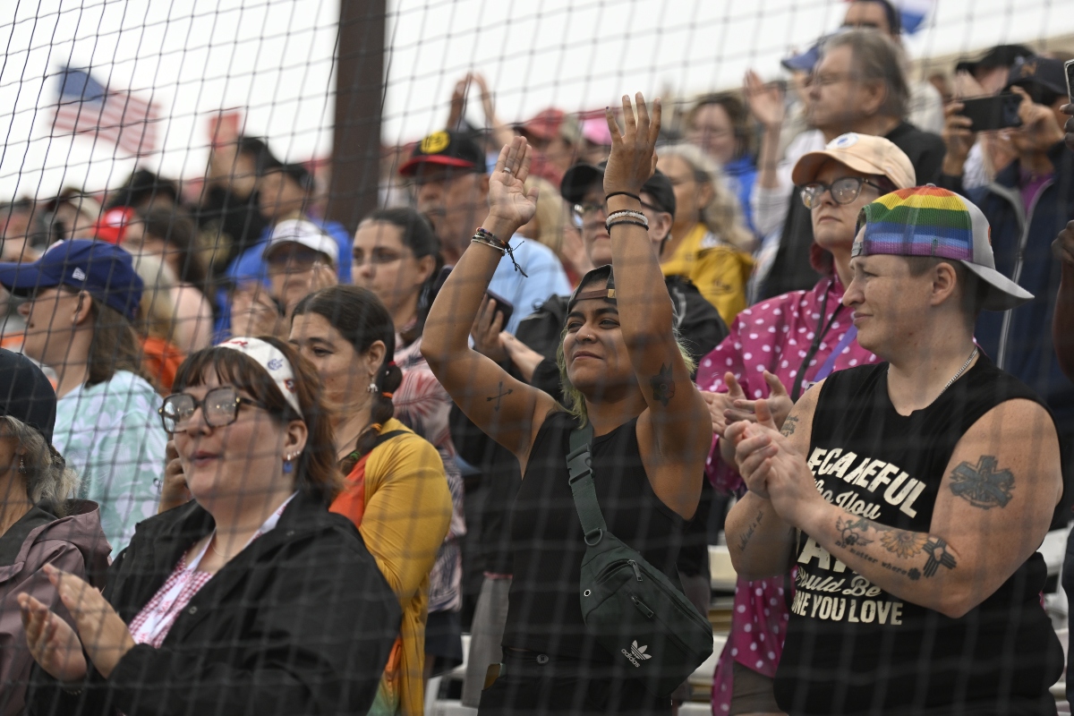 Fans cheer before the inaugural Women's Professional Baseball League game between the Los Angeles Queens and the New York Heights, Saturday, Aug. 1, 2026, in Springfield, Ill. (AP Photo/Lexie Knight)