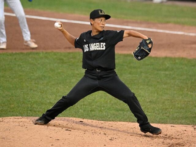 Los Angeles Queens' Ayami Sato pitches during the fourth inning of the inaugural Women's Professional Baseball League game against the New York Heights, Saturday, Aug. 1, 2026, in Springfield, Ill. (AP Photo/Lexie Knight)