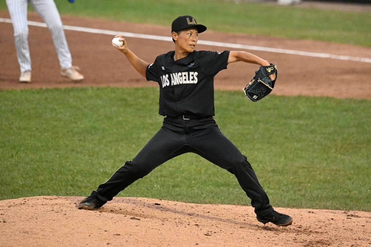 Los Angeles Queens' Ayami Sato pitches during the fourth inning of the inaugural Women's Professional Baseball League game against the New York Heights, Saturday, Aug. 1, 2026, in Springfield, Ill. (AP Photo/Lexie Knight)