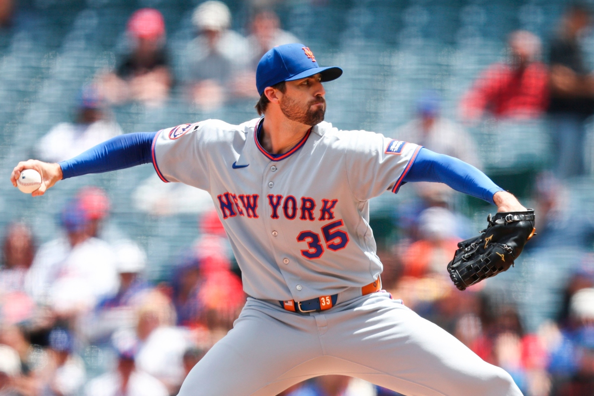 FILE - New York Mets pitcher Clay Holmes throws to a Los Angeles Angels batter during the first inning of a baseball game, May 3, 2026, in Anaheim, Calif. (AP Photo/Jessie Alcheh, File)