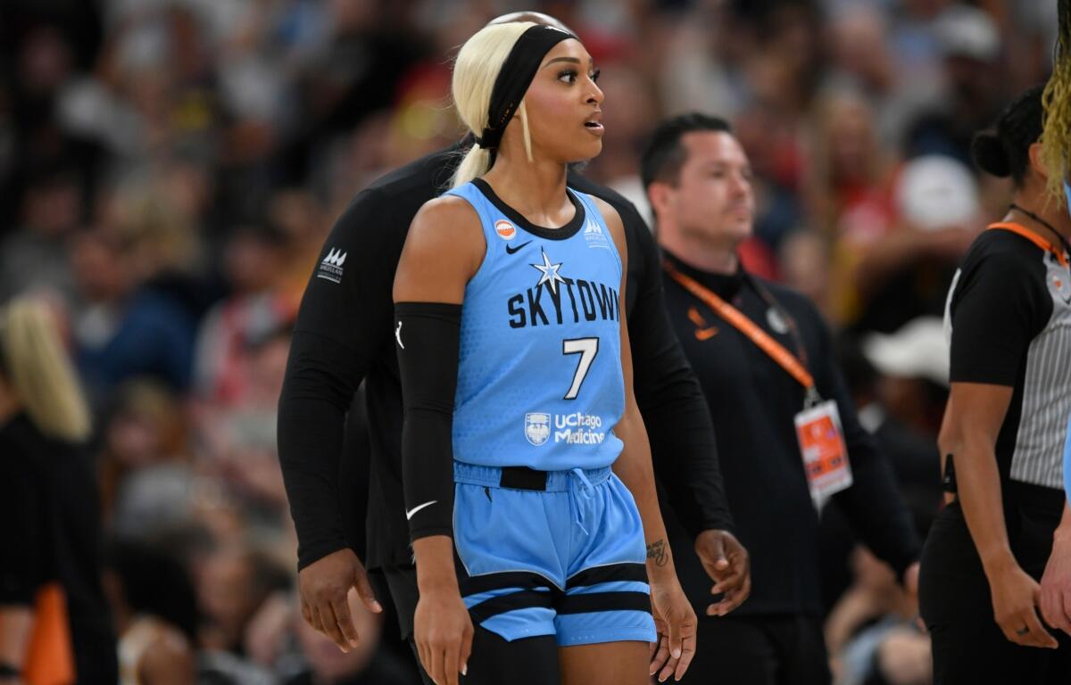 Chicago Sky's DiJonai Carrington walks off the court ejected from the game for committing a flagrant foul against Indiana Fever's Sophie Cunningham during the first half of an WNBA basketball game in Chicago, Saturday, Aug. 8, 2026. (AP Photo/Paul Beaty)