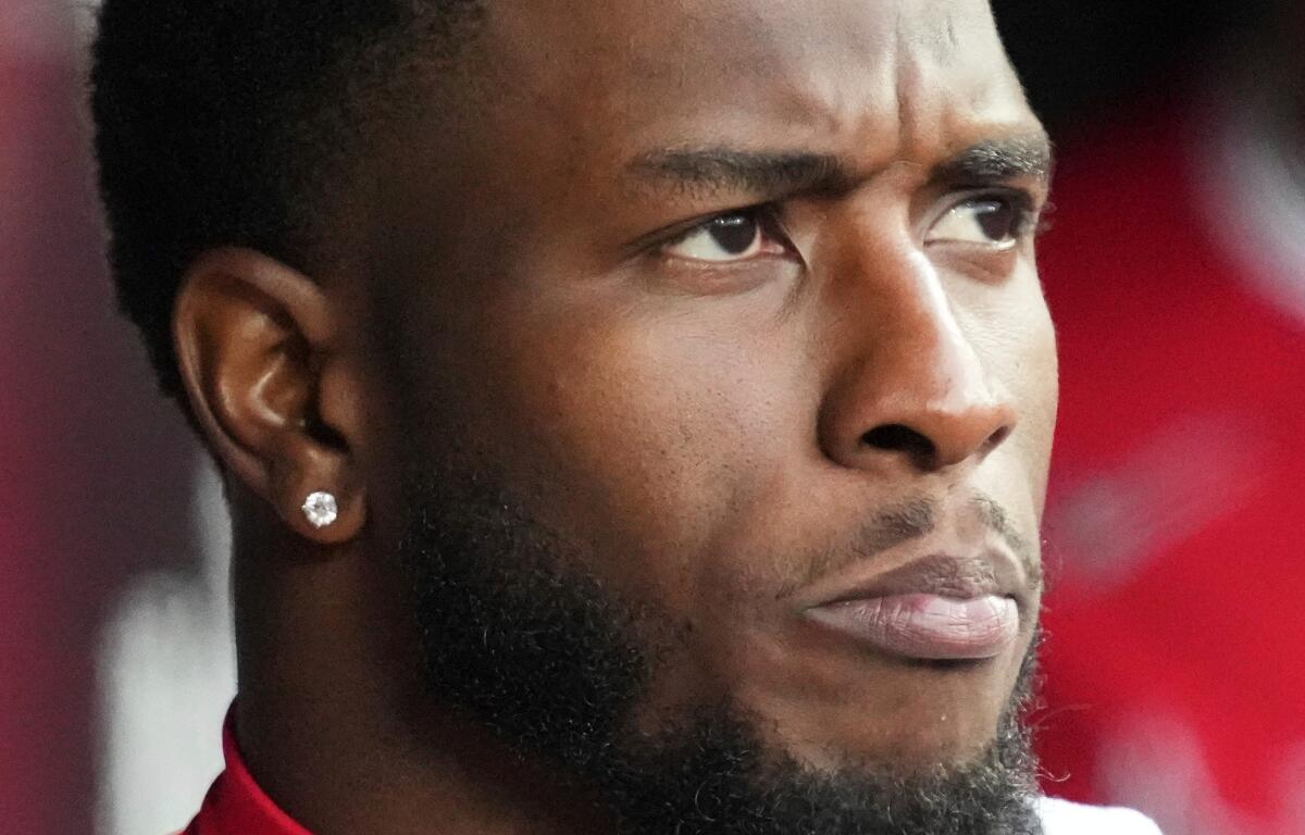 FILE - Tim Anderson, with Los Angeles Angels, looks to the field during the ninth inning of an opening-day baseball game against the Chicago White Sox in Chicago, March 27, 2025. (AP Photo/Nam Y. Huh, File)
