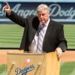 FILE - Los Angeles Dodgers former pitcher Tommy John praises his late friend, Dr. Frank Jobe during a memorial service at Dodger Stadium in Los Angeles, April 7, 2014. (AP Photo/Damian Dovarganes, File)