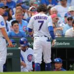 Chicago Cubs manager Craig Counsell, left, walks back to the dugout with Dansby Swanson (7) during the third inning of a baseball game against the St. Louis Cardinals, Sunday, Aug. 16, 2026, in Chicago. (AP Photo/Melissa Tamez)