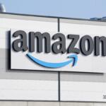 FILE - An Amazon company logo marks the facade of a building, March 18, 2022, in Schoenefeld near Berlin. (AP Photo/Michael Sohn, File)