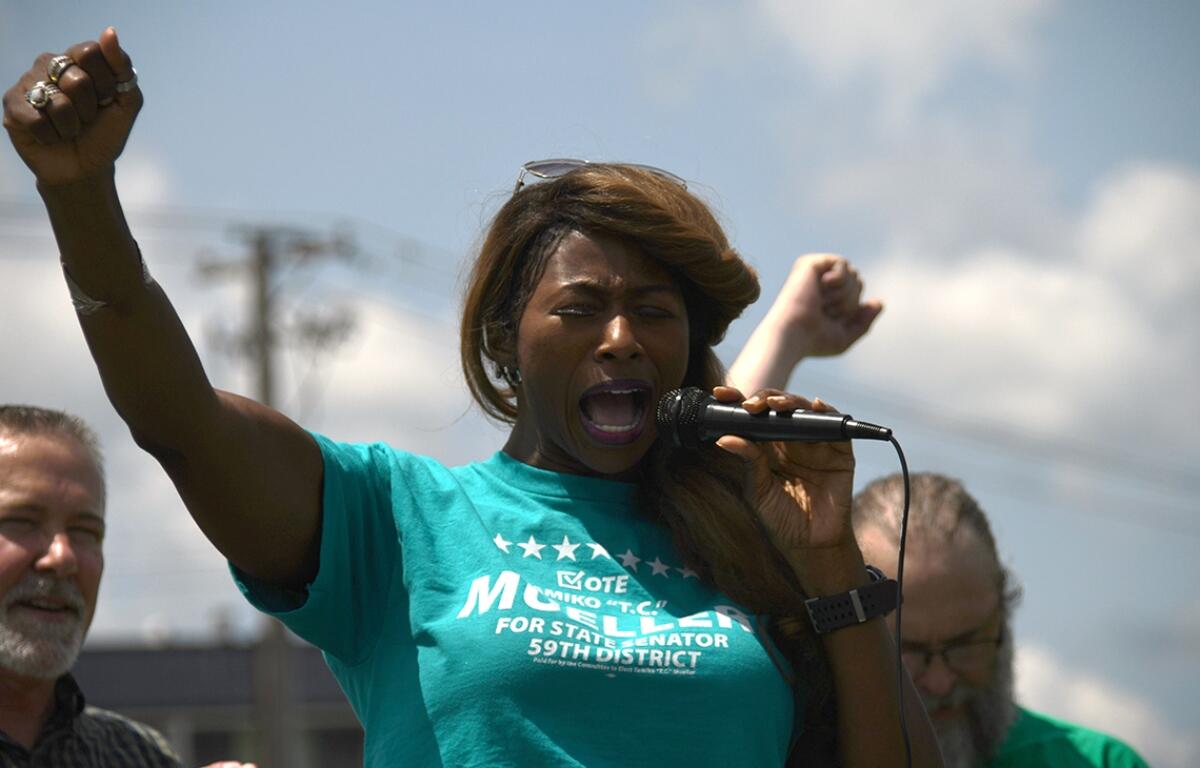 Tamiko Mueller, a Democrat running for Illinois' 59th District state Senate seat, joined workers, families and supporters in Anna on Tuesday to rally against the state's planned downsizing of Choate Mental Health and Developmental Center. (Jackson Brandhorst/Saluki Local Reporting Lab)