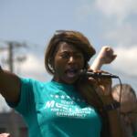 Tamiko Mueller, a Democrat running for Illinois' 59th District state Senate seat, joined workers, families and supporters in Anna on Tuesday to rally against the state's planned downsizing of Choate Mental Health and Developmental Center. (Jackson Brandhorst/Saluki Local Reporting Lab)