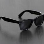 Portland, OR, USA - Dec 5, 2023: A pair of new Ray-Ban Meta Wayfarer smart glasses isolated on a dark gray background.