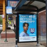 A Chicago bus stop advertises the state’s gambling addiction helpline. (Capitol News Illinois photo by Maggie Dougherty)