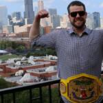 Patrick Bertoletti shows off his Nathan's Hot Dog Eating championship belt in Chicago, his home town.