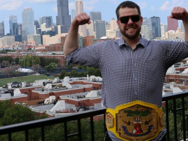 Patrick Bertoletti shows off his Nathan's Hot Dog Eating championship belt in Chicago, his home town.