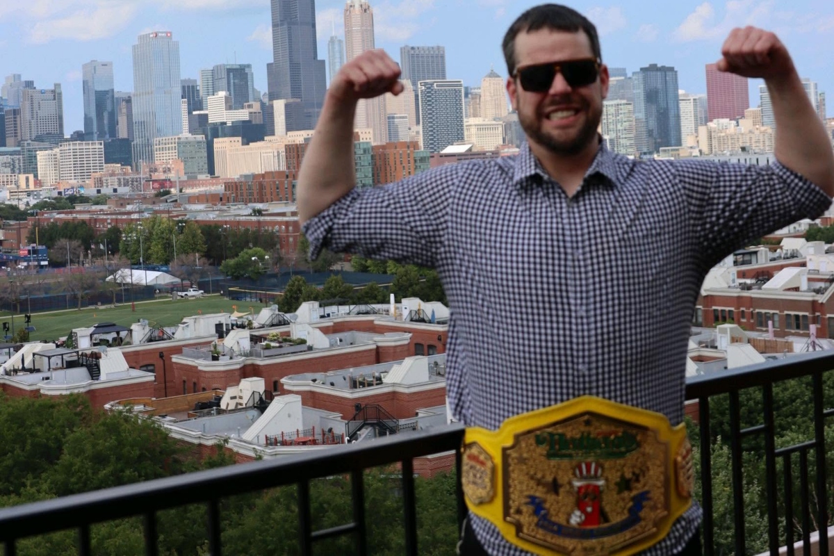 Patrick Bertoletti shows off his Nathan's Hot Dog Eating championship belt in Chicago, his home town.