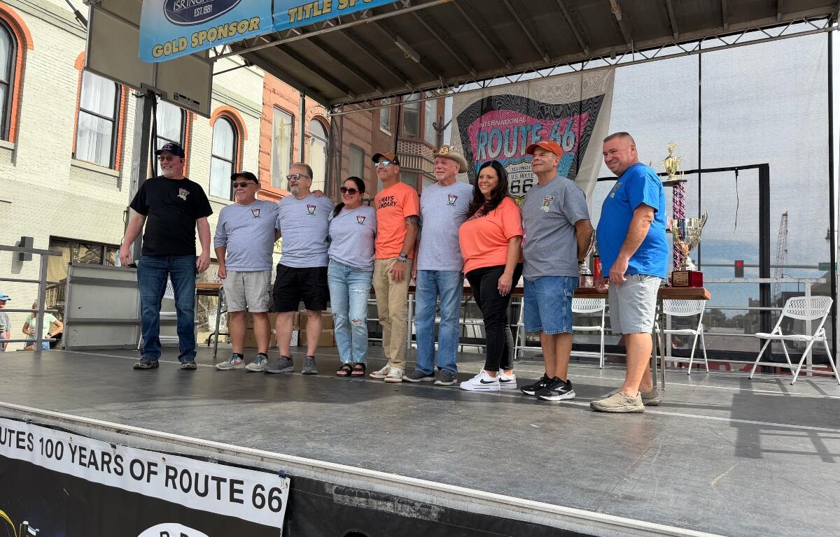 Organizers of the International Route 66 Mother Road Festival and Mayor Misty Buscher gather for a photo Sunday, September 27.,