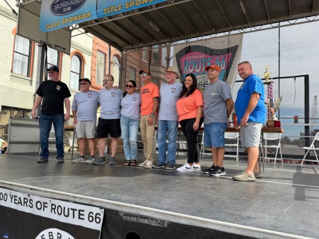 Organizers of the International Route 66 Mother Road Festival and Mayor Misty Buscher gather for a photo Sunday, September 27.,