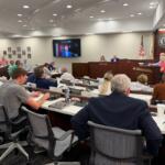 Members of the Sangamon County Board and county officials watch Tuesday, September 1 as consultant Bill Krueger speaks to them via Zoom.