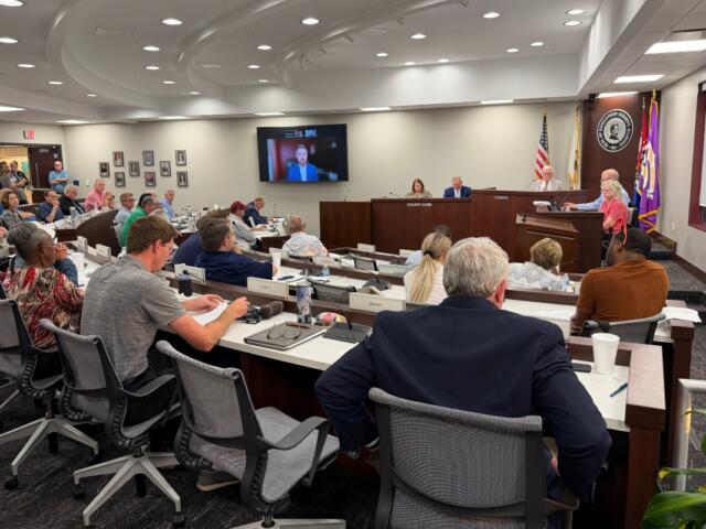 Members of the Sangamon County Board and county officials watch Tuesday, September 1 as consultant Bill Krueger speaks to them via Zoom.