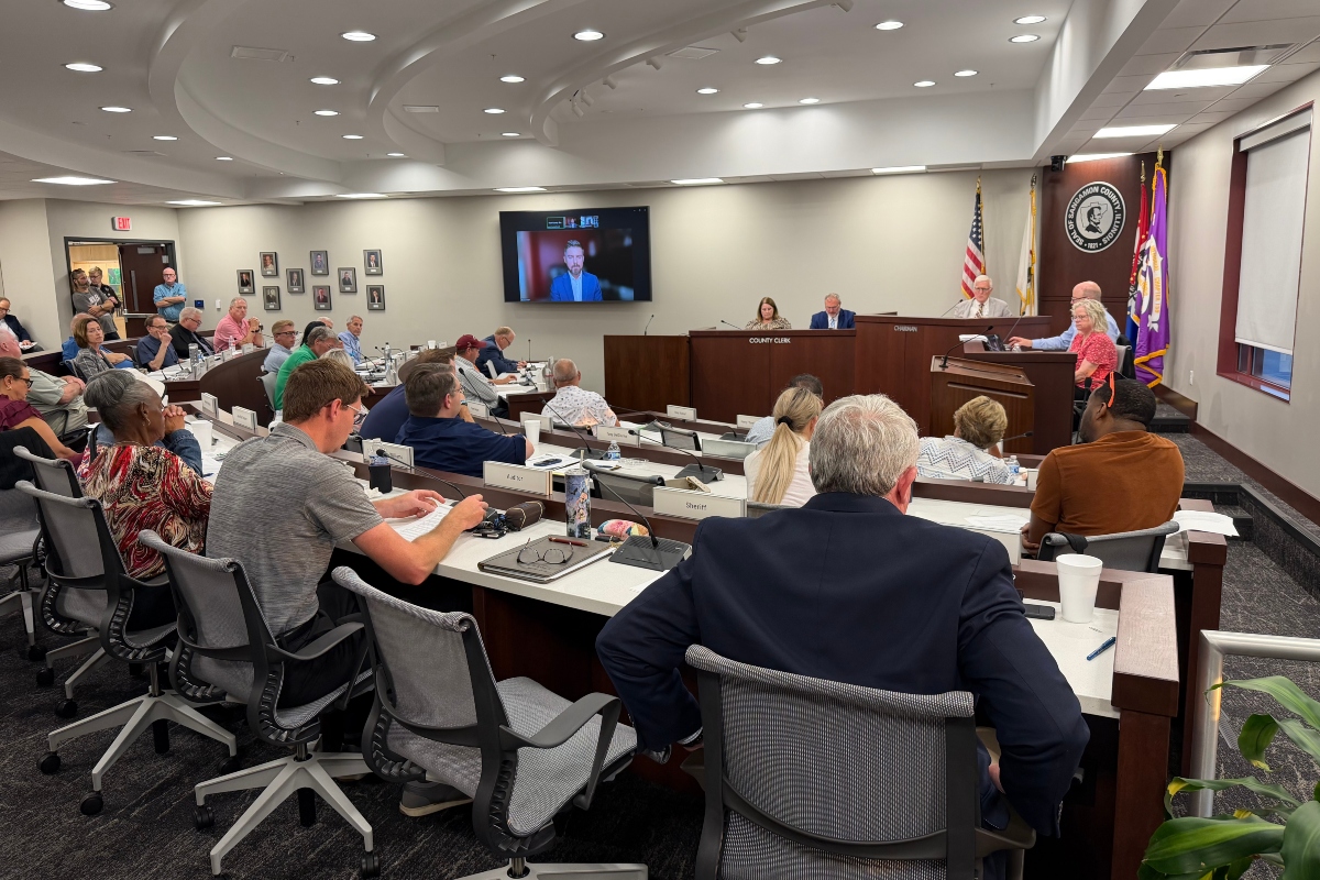 Members of the Sangamon County Board and county officials watch Tuesday, September 1 as consultant Bill Krueger speaks to them via Zoom.