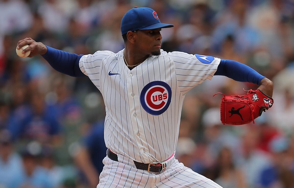 Chicago Cubs starting pitcher Edward Cabrera throws during the first inning of a baseball game against the St. Louis Cardinals, Sunday, Aug. 16, 2026, in Chicago. (AP Photo/Melissa Tamez)
