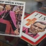 Artifacts and memorabilia depicting the late Archbishop Fulton Sheen are displayed in the Sheen Museum on July 15, 2026, in Peoria, Ill. (AP Photo/Jessie Wardarski)