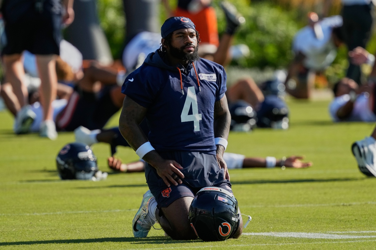 FILE - Chicago Bears running back D'Andre Swift warms up during practice at the team's NFL football training camp, Thursday, July 30, 2026, in Lake Forest, Ill. (AP Photo/Nam Y. Huh,File)