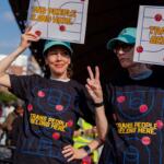 FILE - Demonstrators rally in support of transgender athletes in women's sports outside of Barclay's Center before the WNBA basketball game between the Indiana Fever and the New York Liberty, Aug. 22, 2026, in New York. (AP Photo/Angelina Katsanis, File)