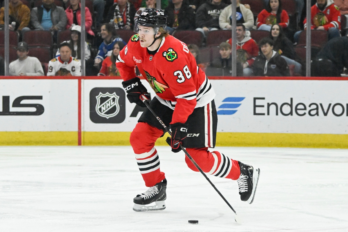 FILE - Chicago Blackhawks defenseman Ethan Del Mastro (38) skates with the puck during the first period of an NHL hockey game against the Tampa Bay Lightning, Jan. 24, 2025, in Chicago. (AP Photo/Matt Marton, File)