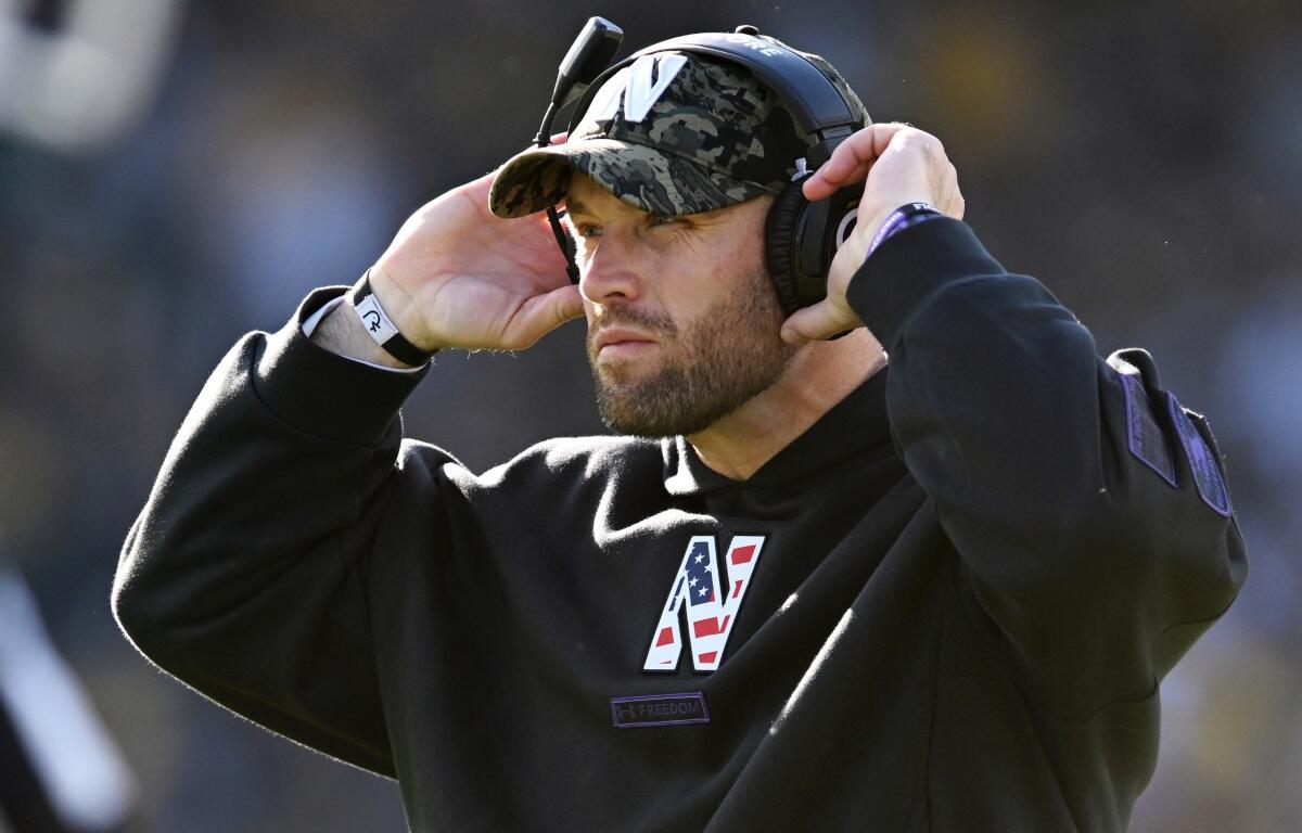 FILE - Northwestern head coach David Braun looks on during the third quarter of an NCAA college football game against Michigan, Nov. 15, 2025, in Chicago. (AP Photo/Paul Beaty, File)