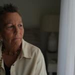 Deb Robertson, a leading advocate for a medical aid-in-dying law named after her in Illinois, pauses during an interview in her home in Lombard, Ill., on Tuesday, Sept. 8, 2026. (AP Photo/Luis Andres Henao)