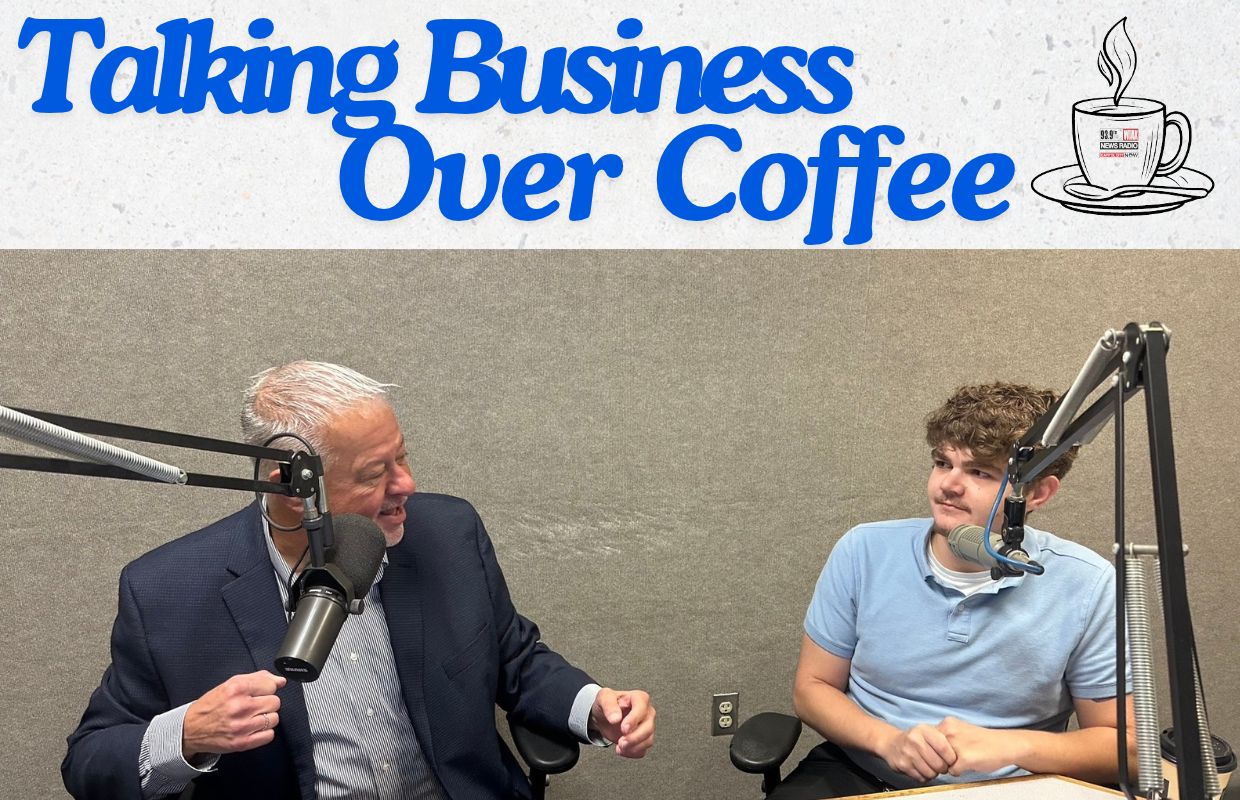 Capitol Media Group VP/GM Chris Bullock talks with Nick Tranquilli of Dust Busters in Springfield.