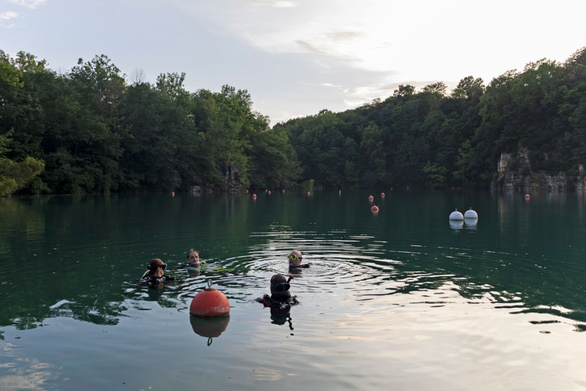 Divers from Great American Divers in St. Charles, Missouri, practice at Mermet Springs on July 17, 2026, in Belknap, Illinois. (Peyton Cook for the Saluki Local Reporting Lab)