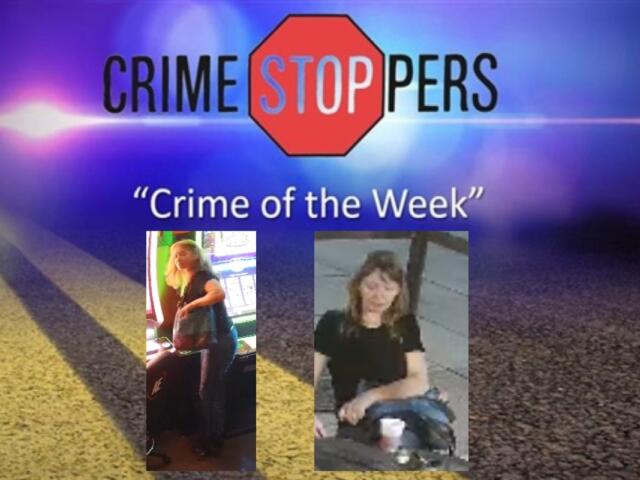 This person is suspected of stealing a wallet and putting it in a large purse.