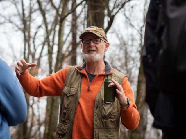Charles Ruffner leads students on a hike in early March at Touch of Nature in Makanda, Illinois. (Cooper Wackerlin for the Saluki Local Reporting Lab)