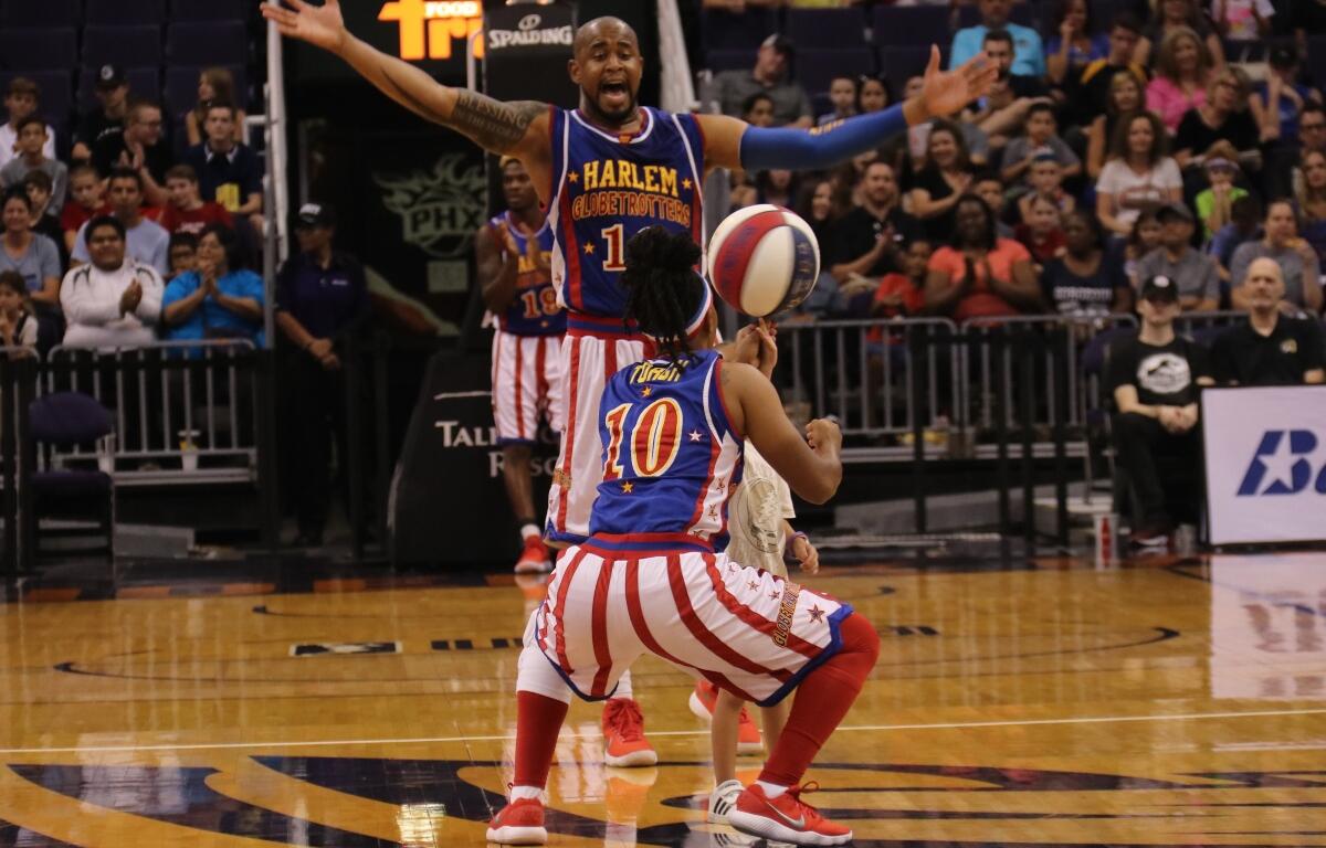 FILE - The Harlem Globetrotters at Talking Stick Resort Arena in Phoenix Arizona USA August 11,2018.