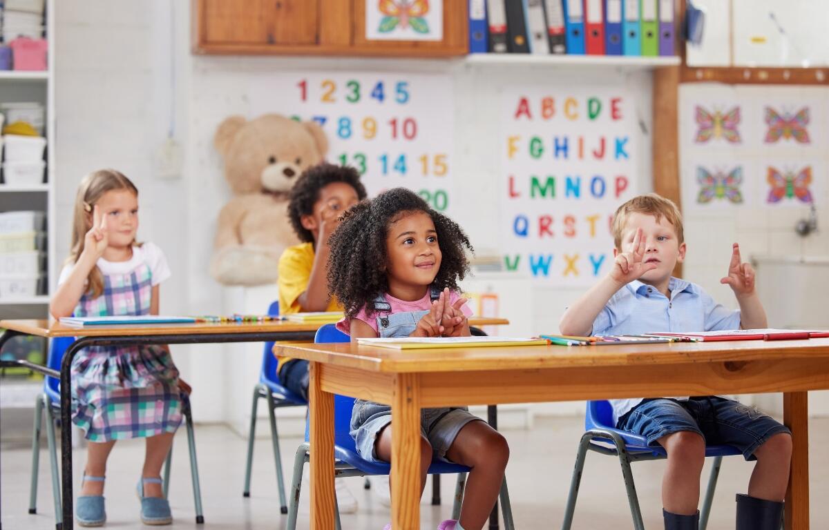 With preschool, your child gets a head start. Shot of a group of preschool students sitting in a classroom.