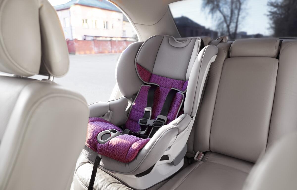 Empty modern child safety seat inside car.