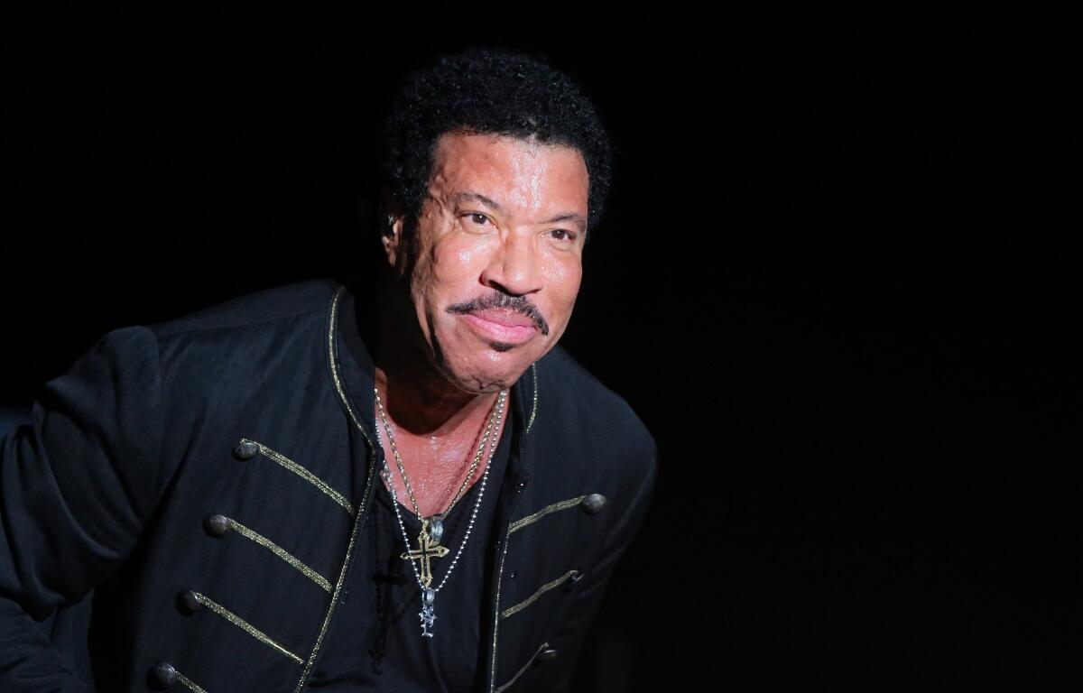 Manchester, Tennessee USA - 06-14-2014: Lionel Richie and his band perform at Bonnaroo Music Festival