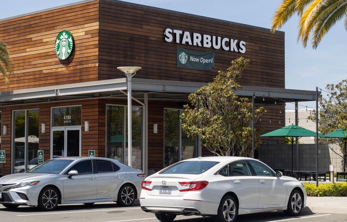 San Jose, CA, USA - Apr 29, 2022: Exterior view of a Starbucks Coffee shop in San Jose, California. Starbucks Corporation is an American multinational chain of coffeehouses and roastery reserves.