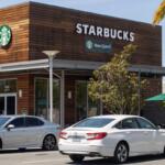 San Jose, CA, USA - Apr 29, 2022: Exterior view of a Starbucks Coffee shop in San Jose, California. Starbucks Corporation is an American multinational chain of coffeehouses and roastery reserves.