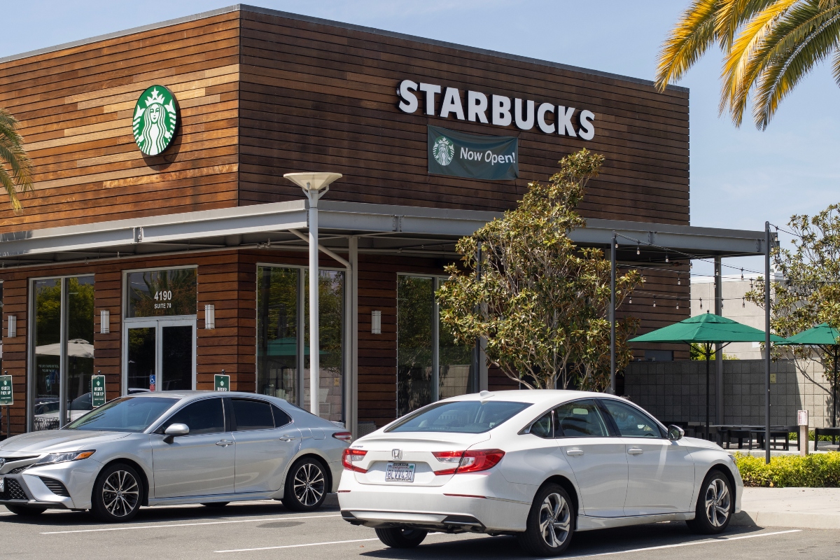 San Jose, CA, USA - Apr 29, 2022: Exterior view of a Starbucks Coffee shop in San Jose, California. Starbucks Corporation is an American multinational chain of coffeehouses and roastery reserves.