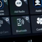 Close up of car infotainment screen with Bluetooth option. Toronto, Canada - February 19, 2026.