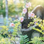Grave with flowers decorated grave, in cemetery, with grave, flowers, with stone, metal texture, from a close-up perspective, with pink, green accents, and serene respectful mood, clear detail.
