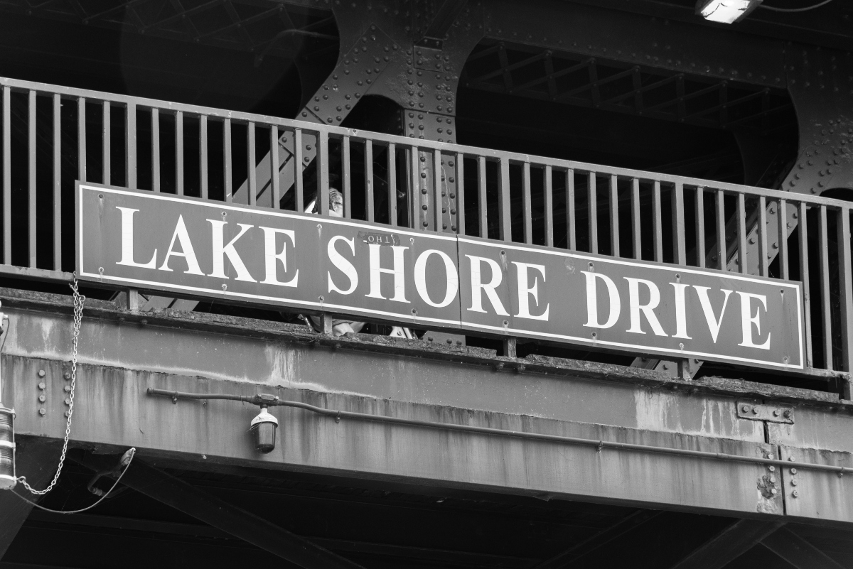 FILE - Big Lake Shore Drive sign on a Chicago bridge