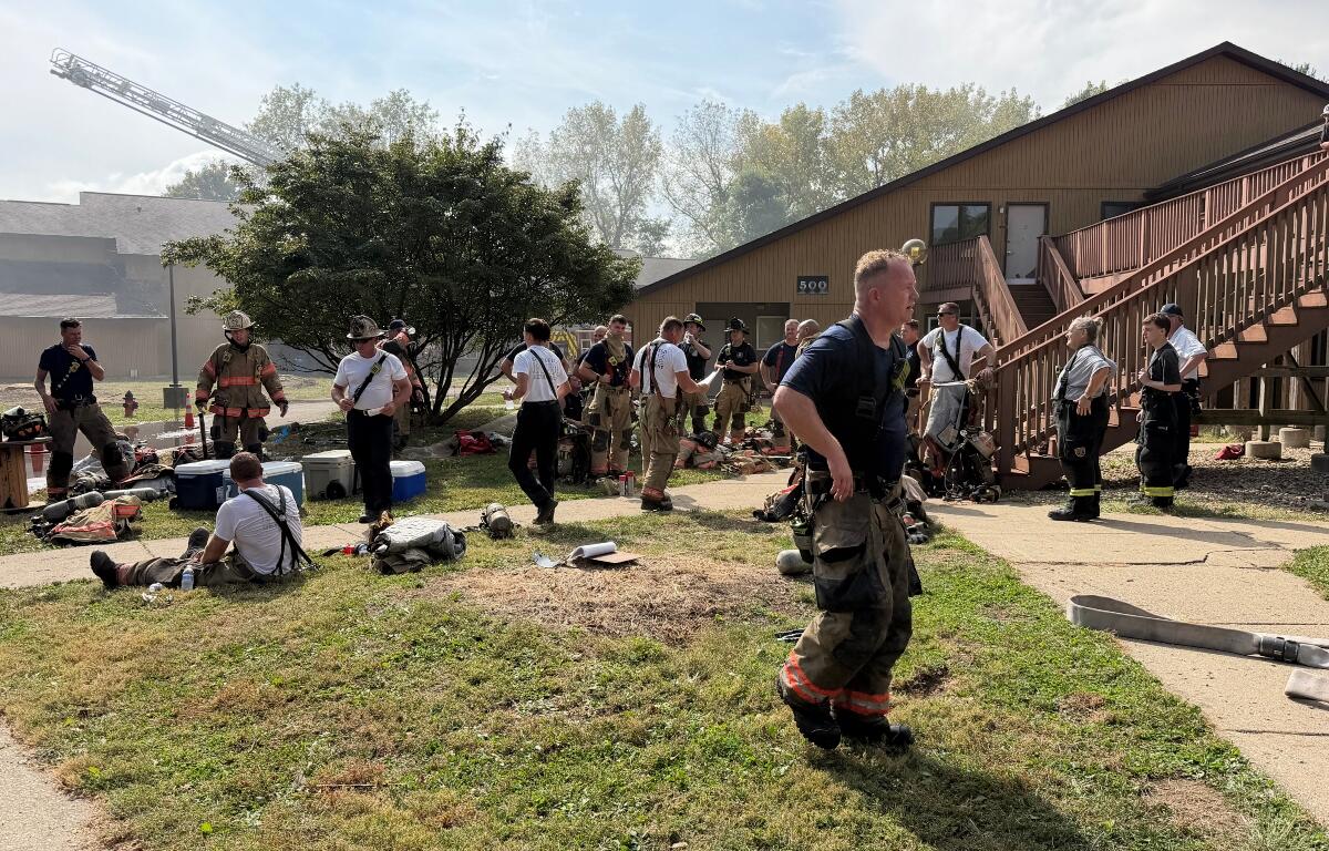 Springfield Firefighters get back to work following a briefing during firefighter training at the University of Illinois Springfield Wednesday, October 14, 2026.