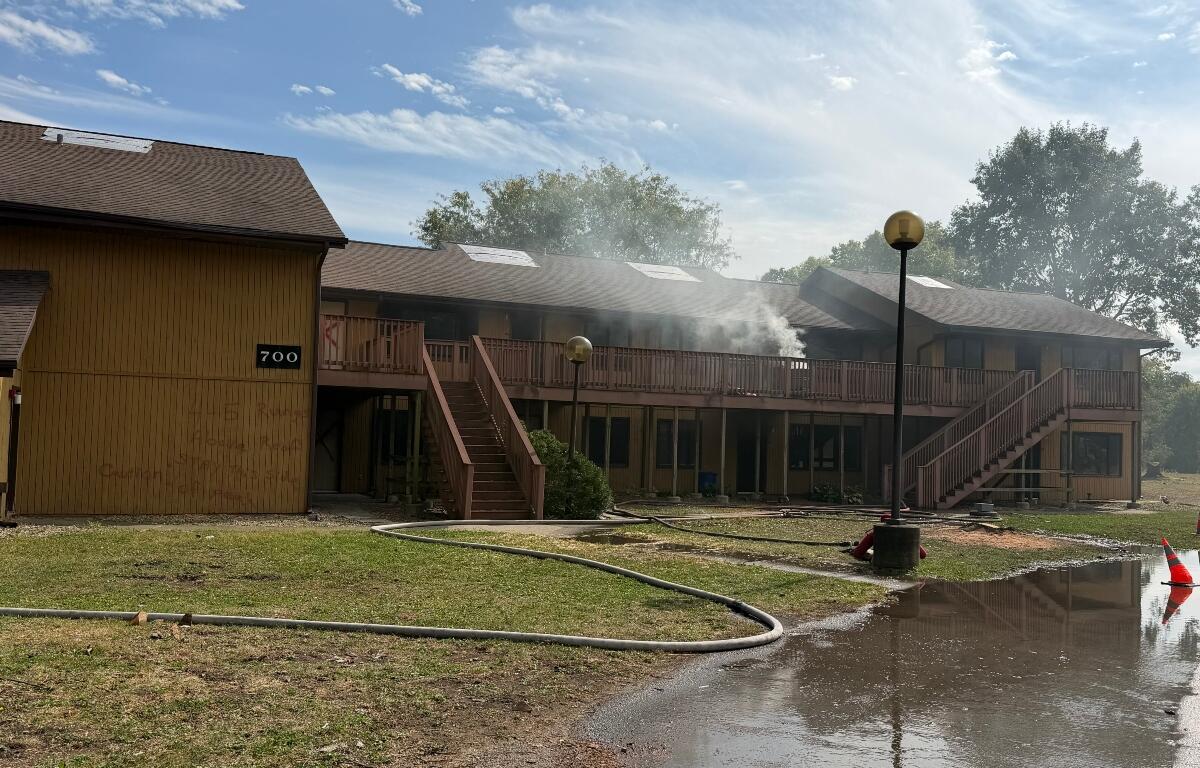 Smoke can be seen coming from one of three now-closed apartment buildings on Sunflower Court at the University of Illinois Springfield Wednesday, October 14, 2026, during firefighter training.