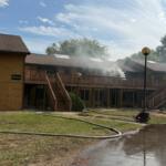 Smoke can be seen coming from one of three now-closed apartment buildings on Sunflower Court at the University of Illinois Springfield Wednesday, October 14, 2026, during firefighter training.