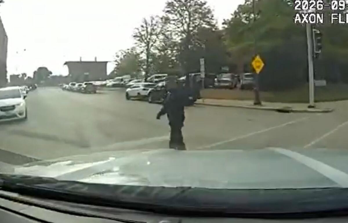 A screen shot of the dash camera video of Lt. Andrew Henton's squad car before it hit a pedestrian September 24, 2026.