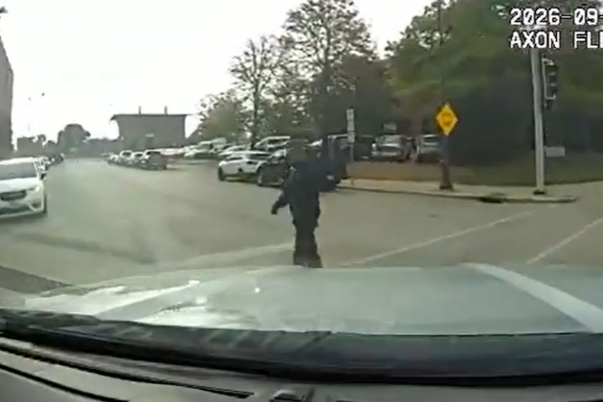 A screen shot of the dash camera video of Lt. Andrew Henton's squad car before it hit a pedestrian September 24, 2026.