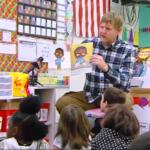 Shane Briggs reads to students at Southern View Elementary School in Springfield District 186.