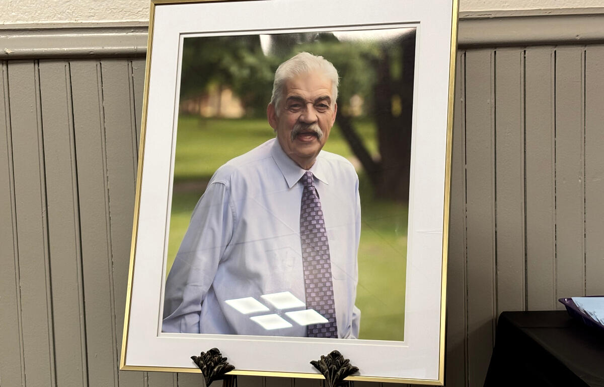 A picture of the late Mike Zimmers is on display inside the building now bearing his name.  (Dave Dahl)